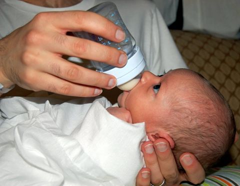 Eating with Dad is so easy, fast, and fun…but stop squishing my ear!