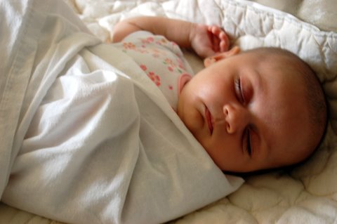 I can always escape from a Mom-swaddle!