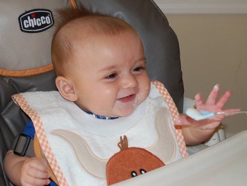 “Eating” rice cereal!