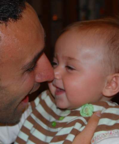 Dad and I celebrating his return with screams!