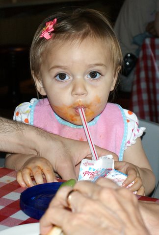 Drinking milk like a big girl!