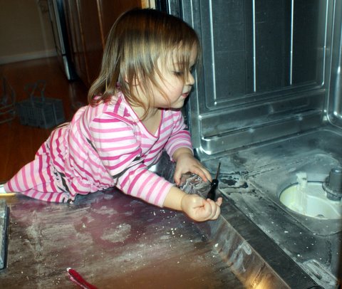 Helping Dad fix the dishwasher
