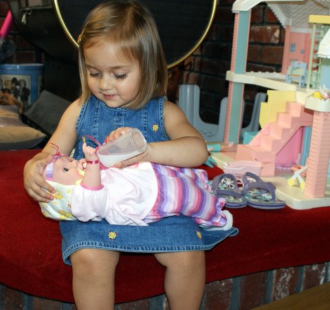 Practicing to be a big sister!